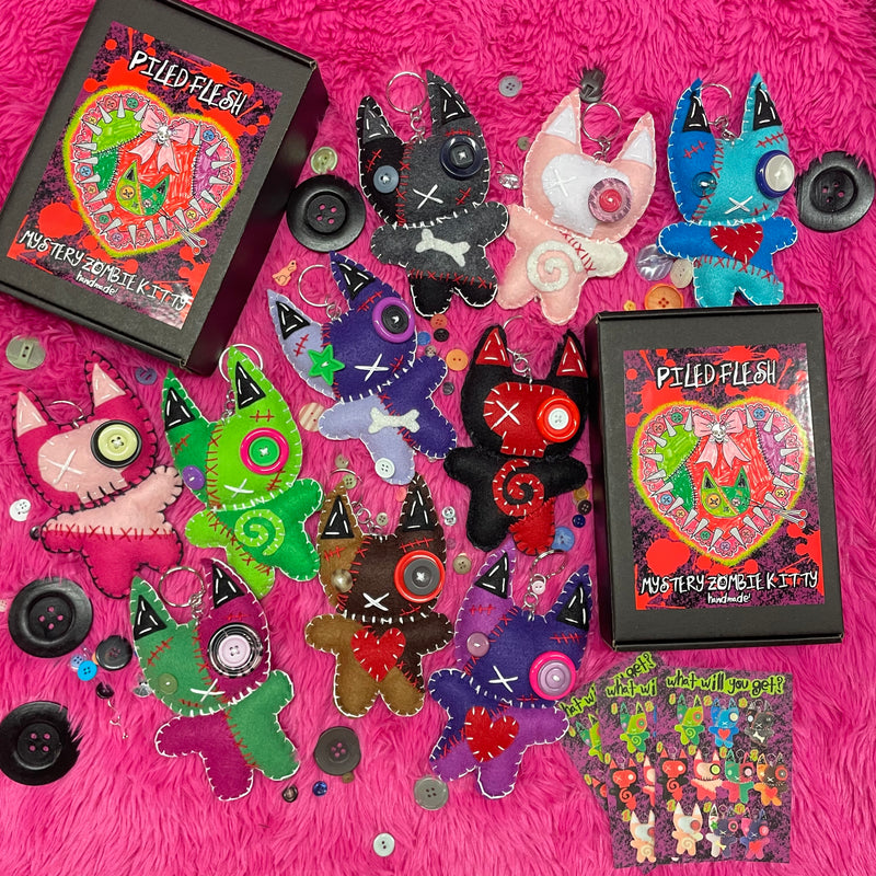 MYSTERY ZOMBIE KITTY KEYCHAINS